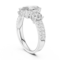 Elegant Oval Three-Stone Diamond Ring with Pavé Shoulders