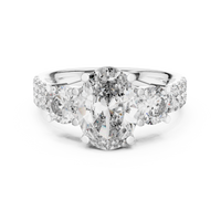 Elegant Oval Three-Stone Diamond Ring with Pavé Shoulders