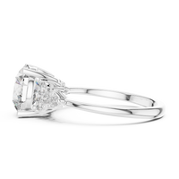 Blue Diamond Halo Accent Solitaire Ring