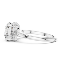 Blue Diamond Solitaire Ring with Marquise Accents