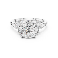 Blue Diamond Solitaire Ring with Marquise Accents
