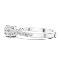 Round Three-Stone Pavé Engagement Ring with Hidden Halo