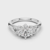 Round Three-Stone Solitaire Engagement Ring